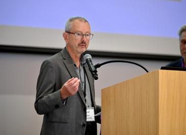 Alec Farquhar at the podium