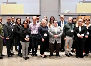 Day 2 speakers posing for a group photo