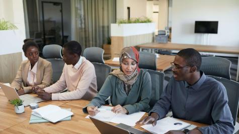 Group of People Sitting in an Office