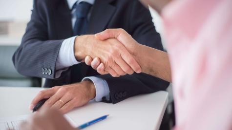 two people shaking hands