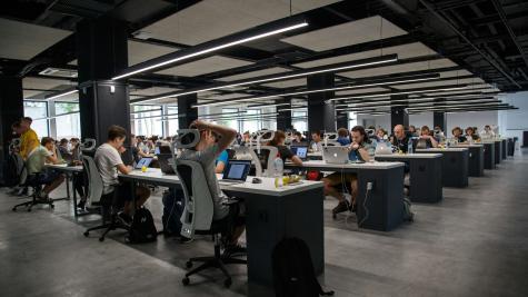 programmers working in a shared workspace