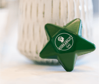 A workability stress star at a table at an employer event