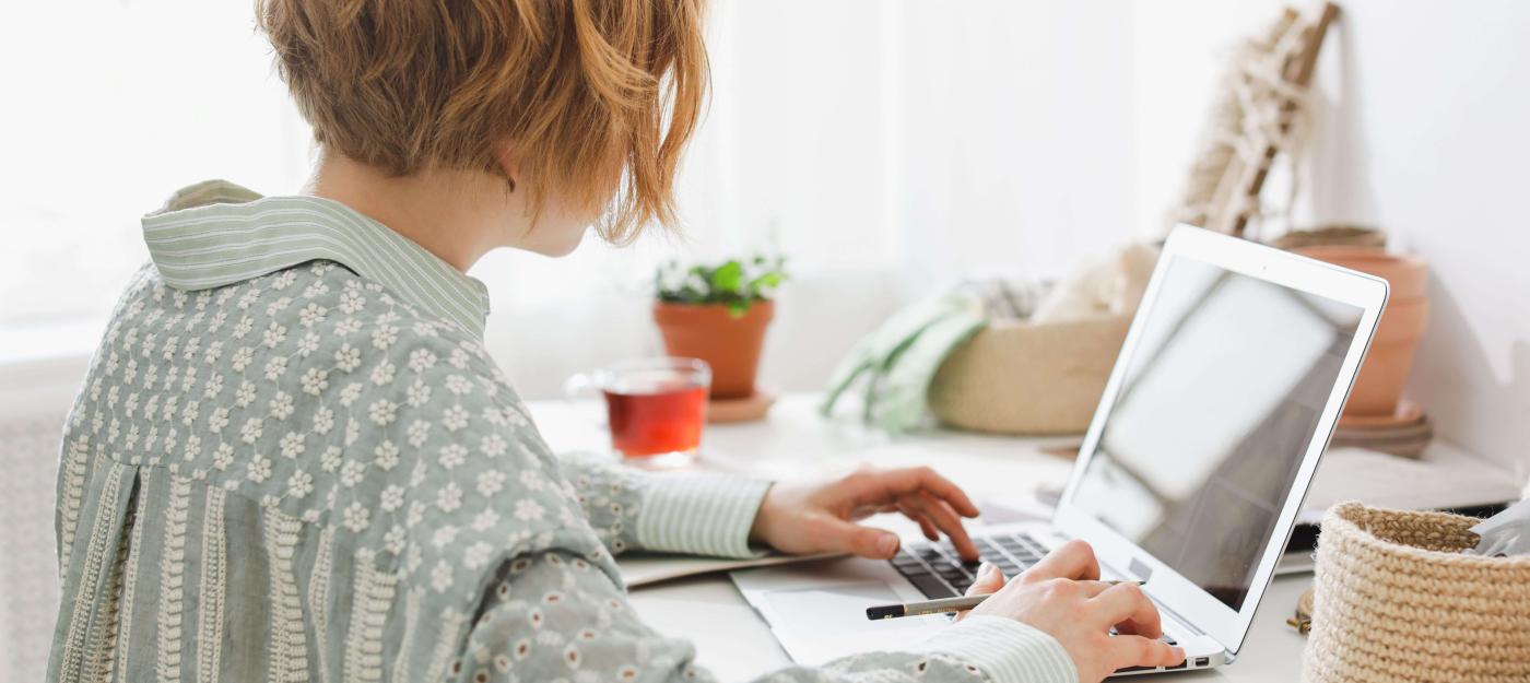 a woman working on her laptop