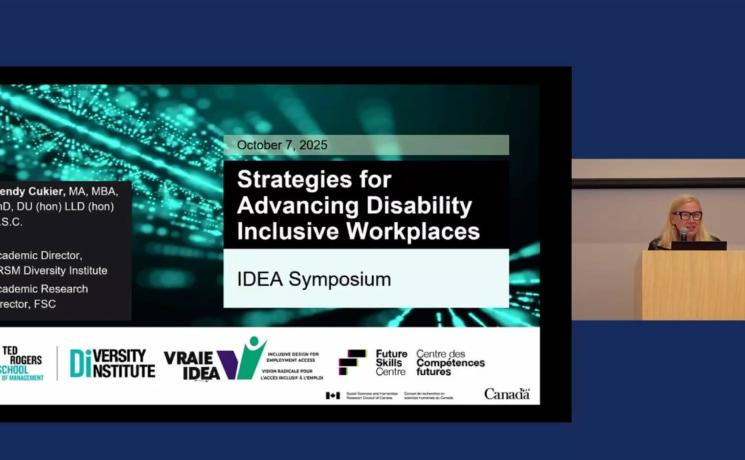 Cover photo of published company names beside a woman giving a presentation at a podium.