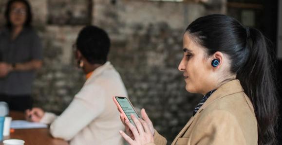 Woman working on a cell phone