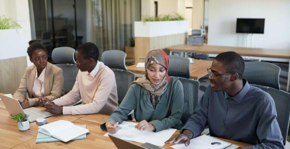 Group of People Sitting in an Office
