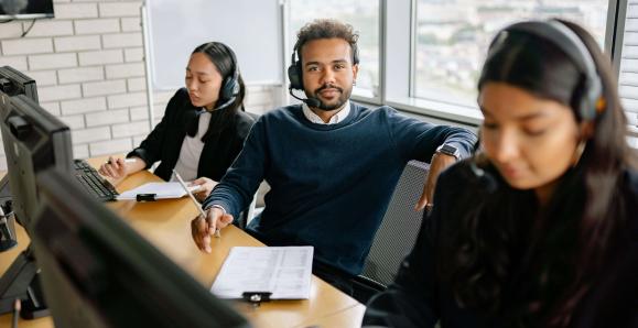 workers with headsets on