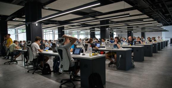 programmers working in a shared workspace