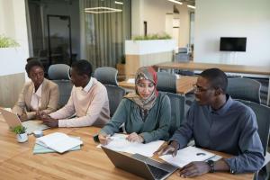 Group of People Sitting in an Office